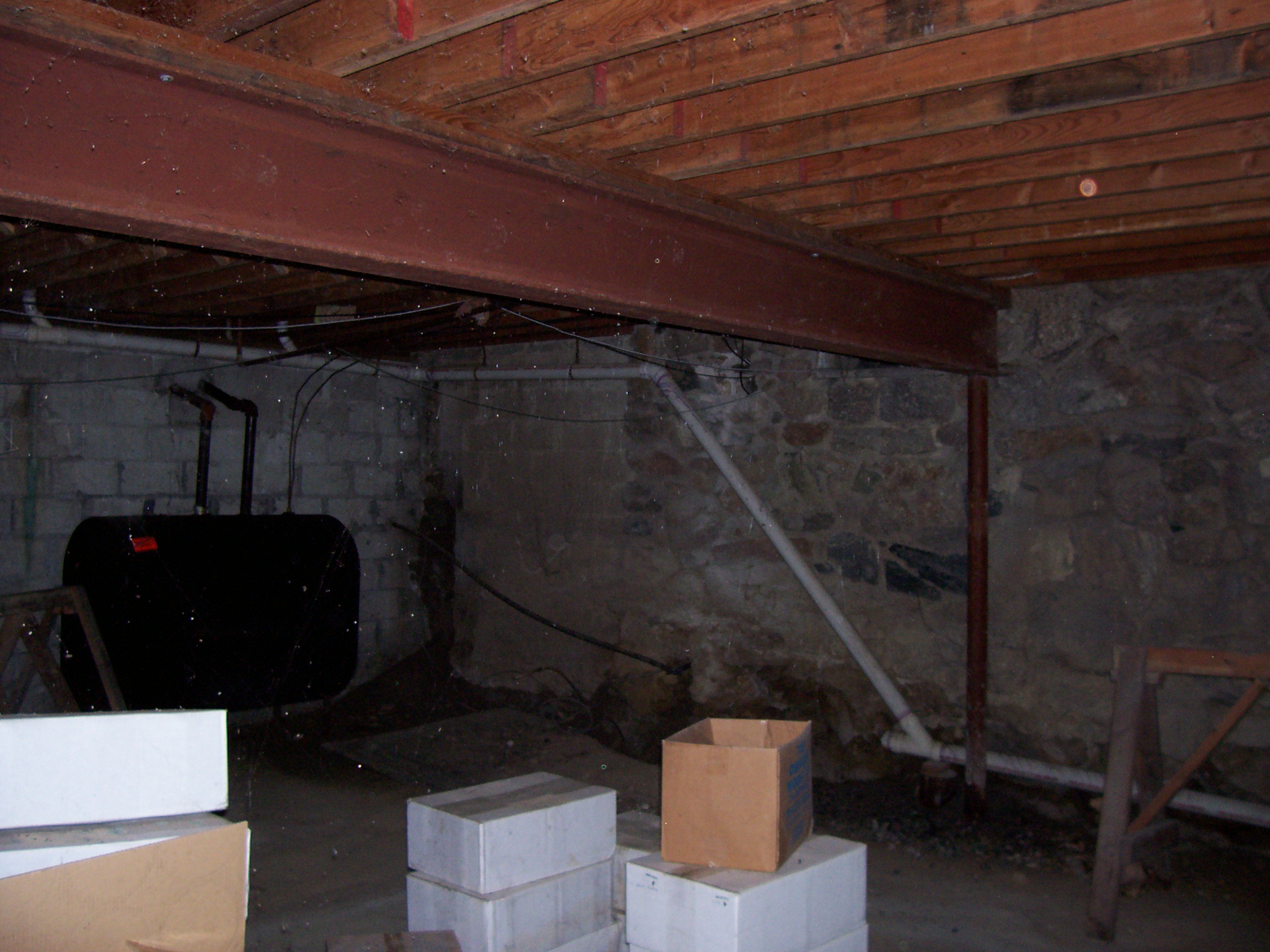 Steel Beam And One Foot On Center Joists Under Main Floor Photo 01